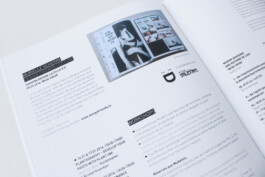 close-up of a magazine page displaying text and an image. 